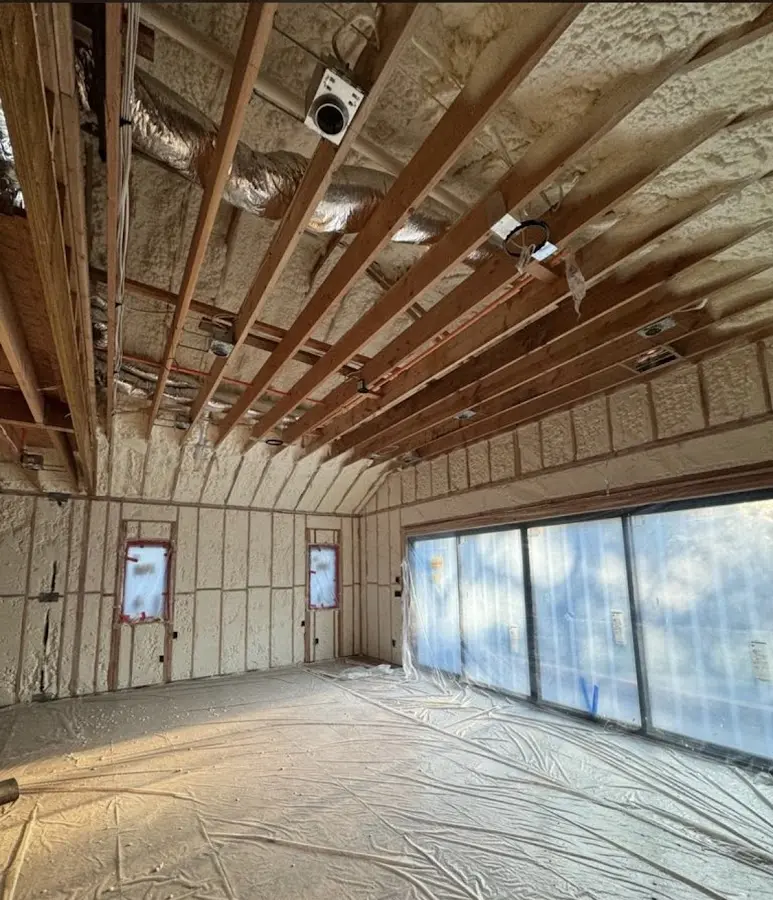 Interior walls and ceiling insulated with spray foam during new construction in Montgomery